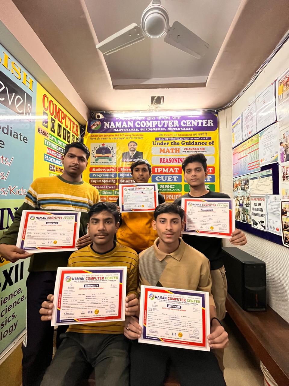 Certificates were distributed to students by Naman Sir at Naman Computer Center.