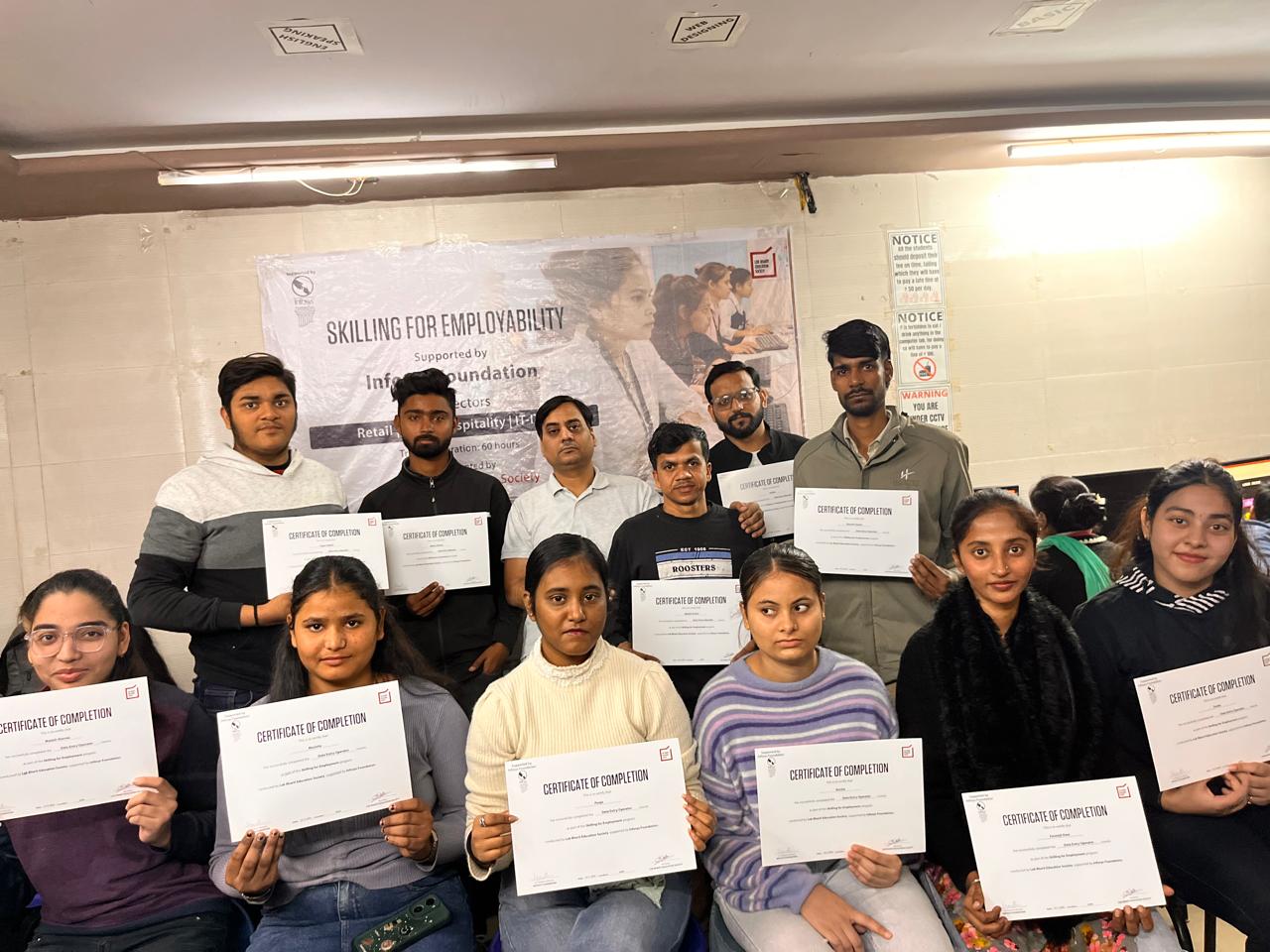 Certificates were distributed to students by Naman Sir at Naman Computer Center.