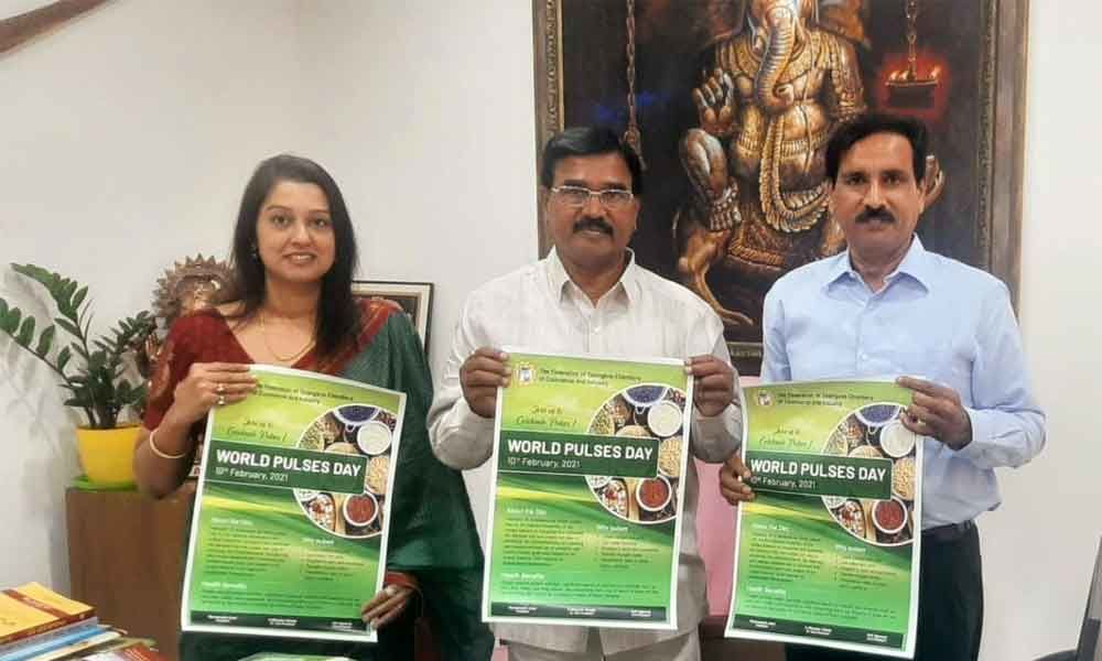 Agriculture Minister Singireddy Niranjan Reddy releasing a wall poster of Telangana Federation of Commerce and Industry