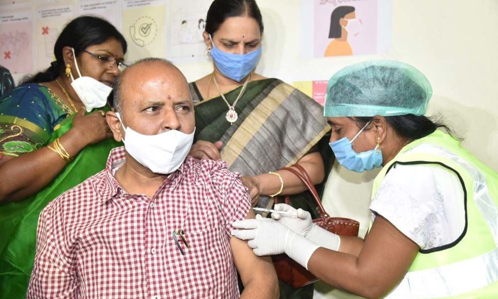 Covid vaccine being administered to District Collector Hari Jawaharlal in Vizianagaram on Wednesday