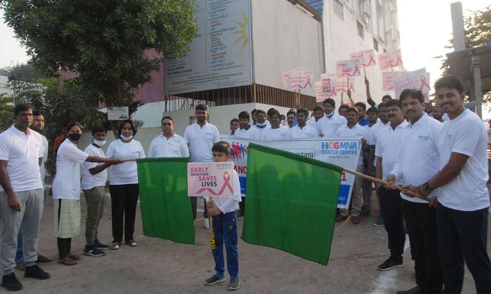 Mt Everest climber SK Himamsa flagging off the walkathon organised by HCG MNR Curie Cancer Centre Ongole on Thursday
