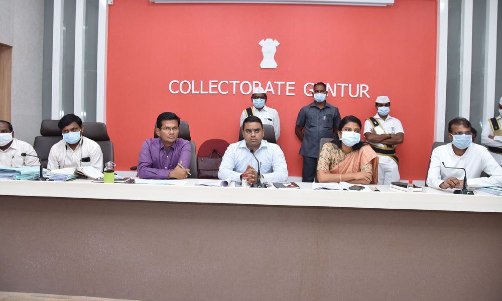 District Collector Vivek Yadav addressing a meeting in Guntur on Thursday