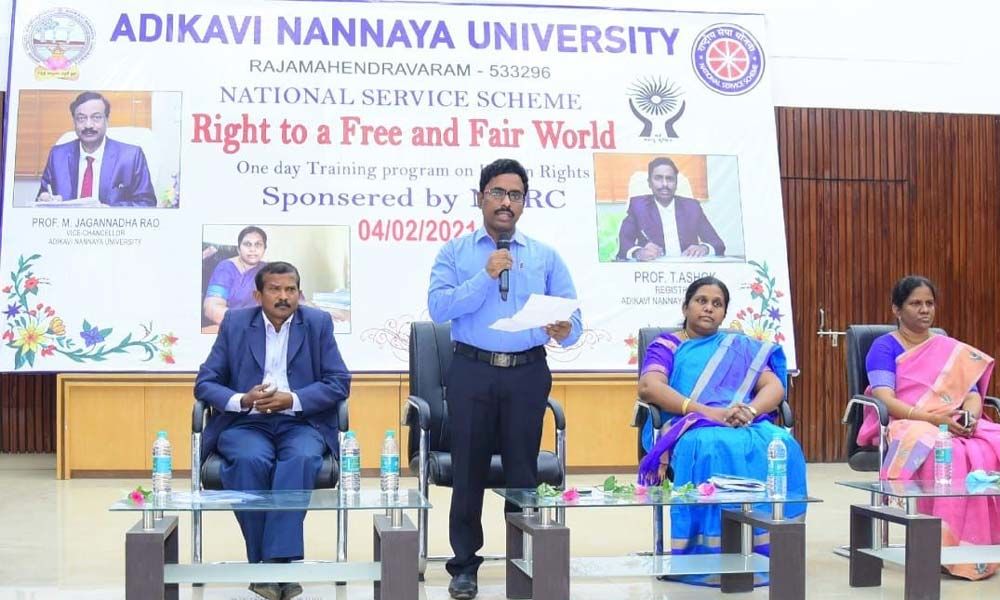 Adikavi Nannaya University Registrar Dr T Ashok addressing a meeting in Rajamahendravaram on Thursday