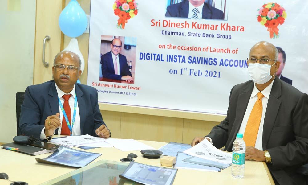 K Praveen Kumar, APGVB chairman and Arvind Kumar, TGB chairman, after launching the Digital Insta Savings Account (DISA) mobile app on Thursday